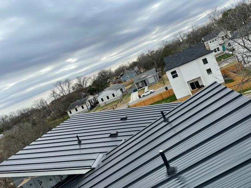 Standing seam metal roof panels with vents for Skylight Repair in Wauconda